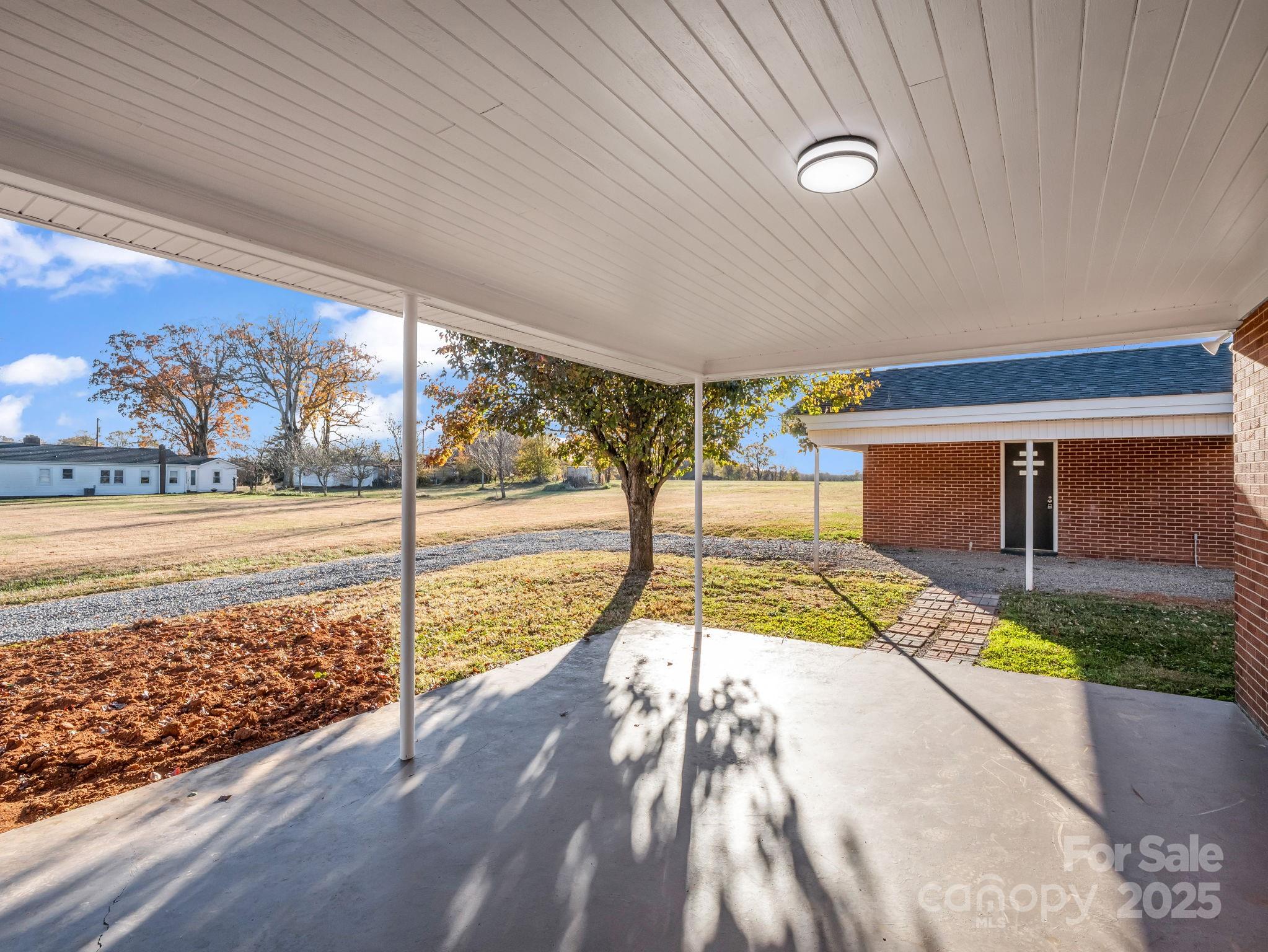 1696 Race Path Church Road Mooresboro, NC 28114 - Photo 5 of 31 a view of a swimming pool and outdoor space