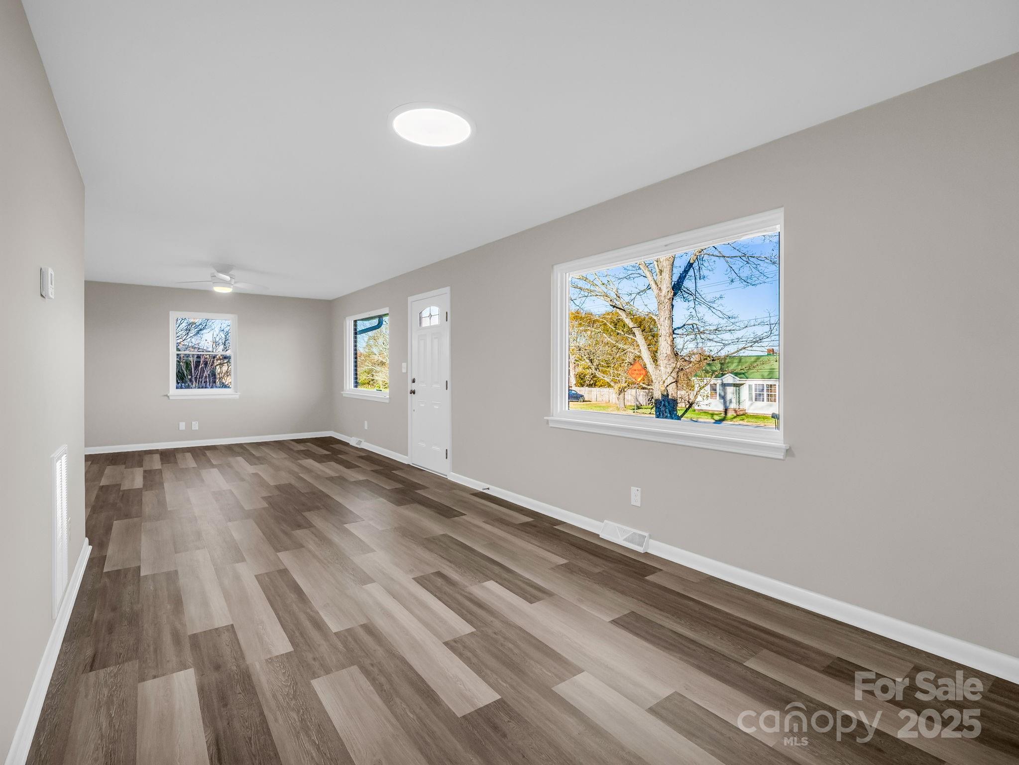 1696 Race Path Church Road Mooresboro, NC 28114 - Photo 7 of 31 a view of empty room with window and ceiling fan