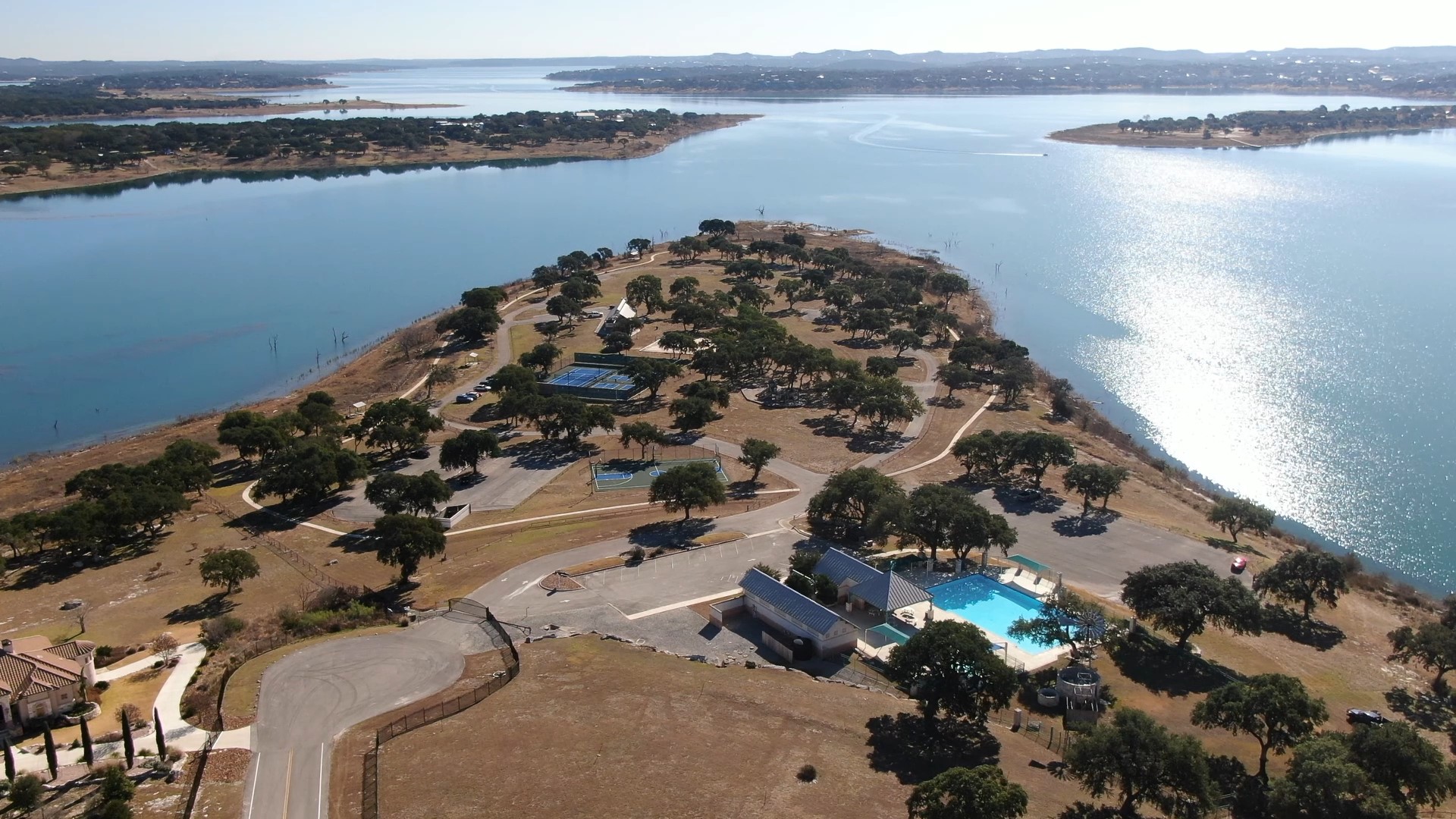 228 Puzzle Pass Spring Branch, TX 78070 - Photo 36 of 36 Mystic Shores Lakefront Park with a pool, lake access, and sports courts.