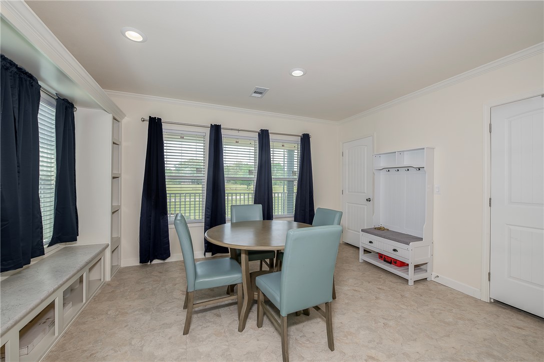 10976 Whiterock Road Bremond, TX 76629 - Photo 11 of 42 a dining room with furniture and window