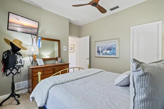 a view of a swimming pool with sitting area