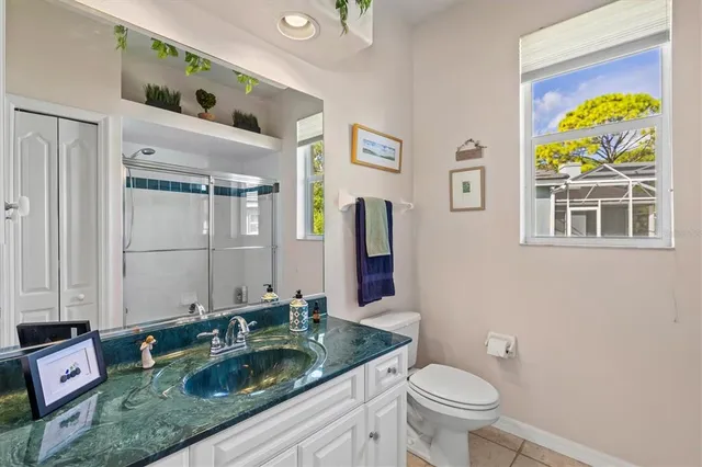 a view of a swimming pool with sitting area