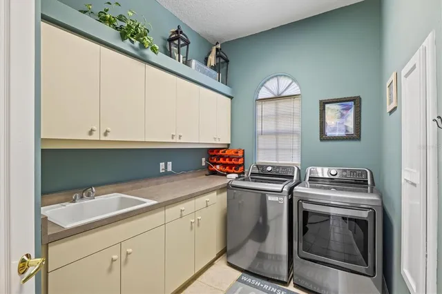 a view of an swimming pool and green space