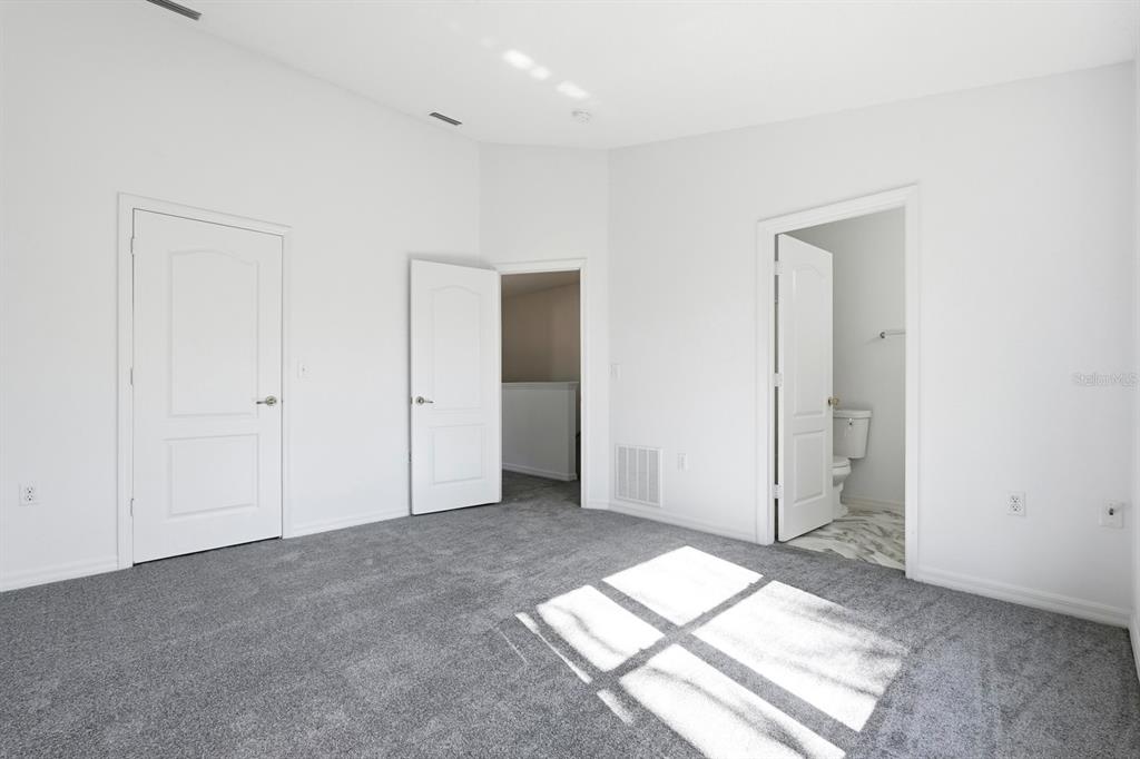 1502 Deer Springs Road Port Orange, FL 32129 - Photo 17 of 35 an empty room with windows