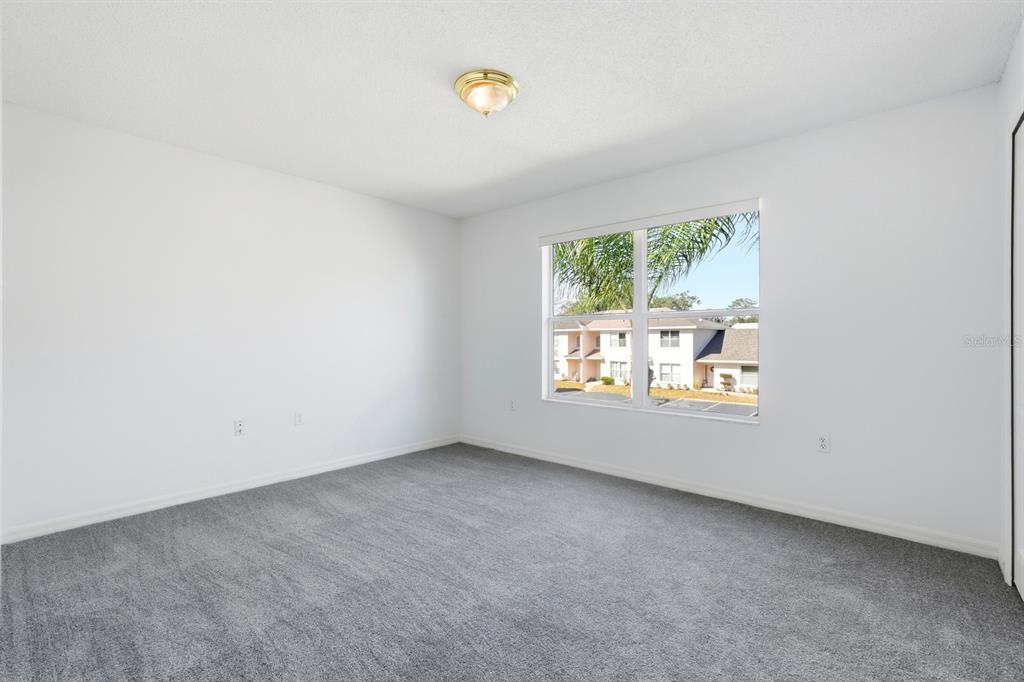 1502 Deer Springs Road Port Orange, FL 32129 - Photo 24 of 35 an empty room with windows