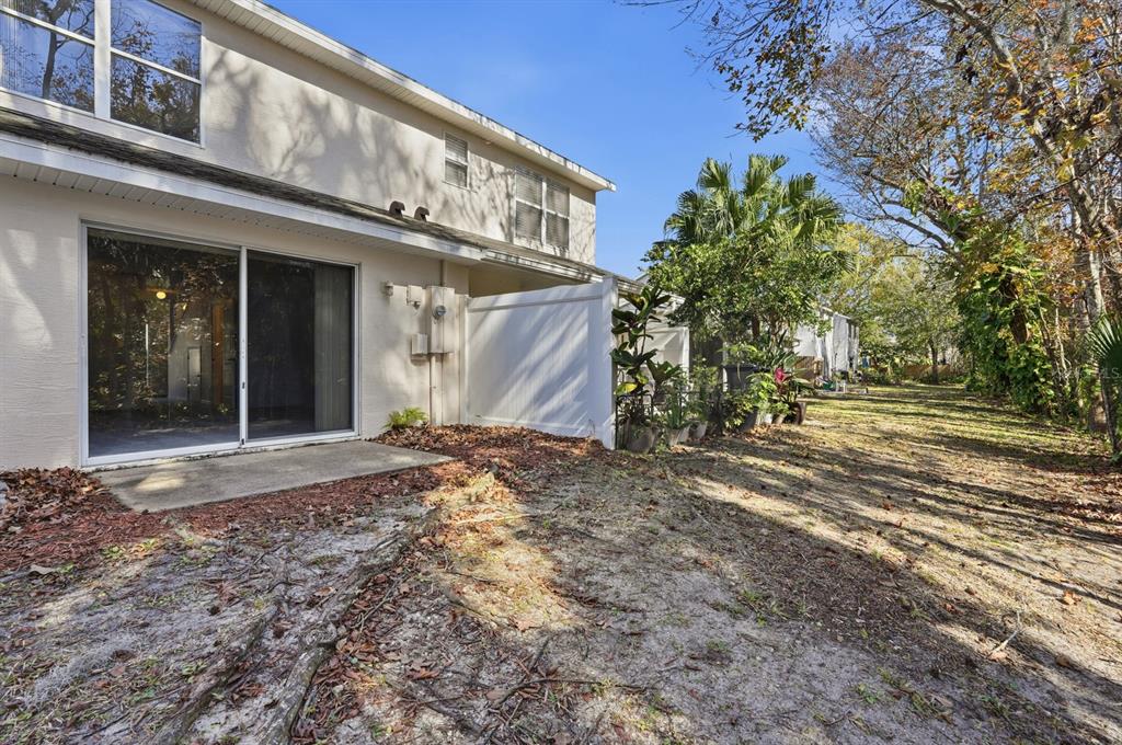 1502 Deer Springs Road Port Orange, FL 32129 - Photo 25 of 35 a view of a house with a yard