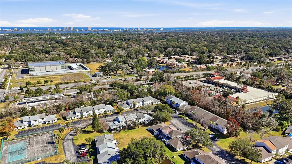 1502 Deer Springs Road Port Orange, FL 32129 - Photo 31 of 35 an aerial view of residential houses with outdoor space