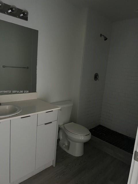 751 Northwest 1st Street, Unit 103 Miami, FL 33128 - Photo 9 of 11 a bathroom with a toilet and a sink