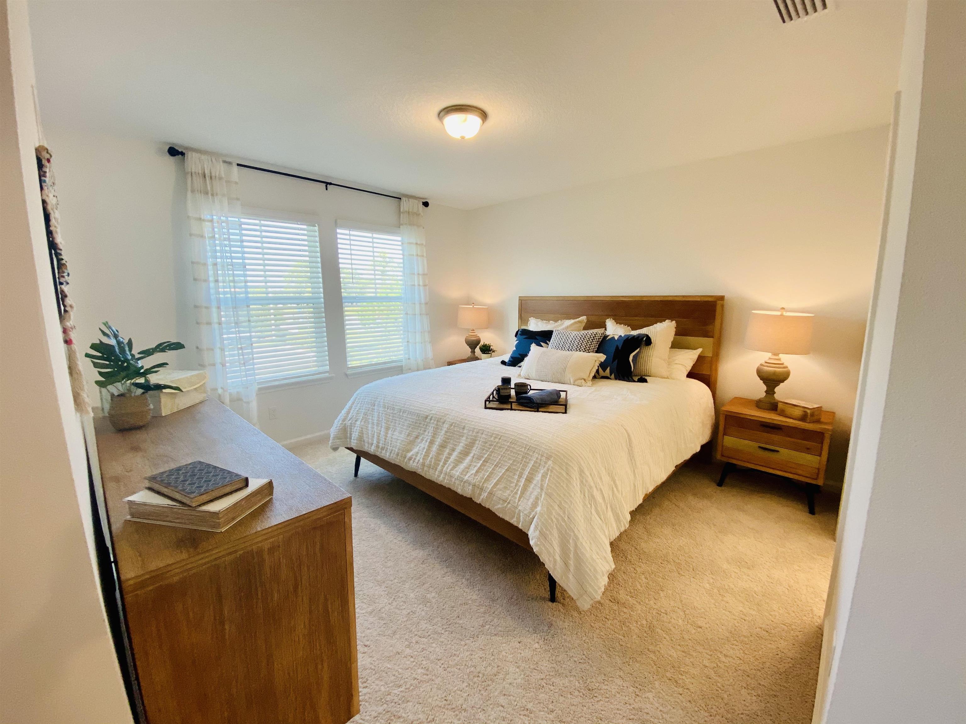 58 Ridge Lake Rd Street St. Augustine, FL 32086 - Photo 1 of 23 a bedroom with bed and window