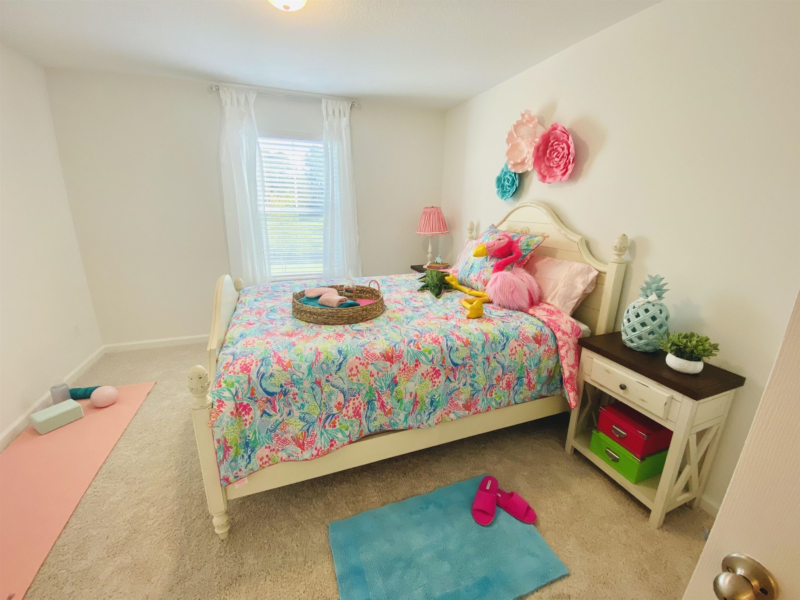 58 Ridge Lake Rd Street St. Augustine, FL 32086 - Photo 5 of 23 a bedroom with a bed a window and dresser