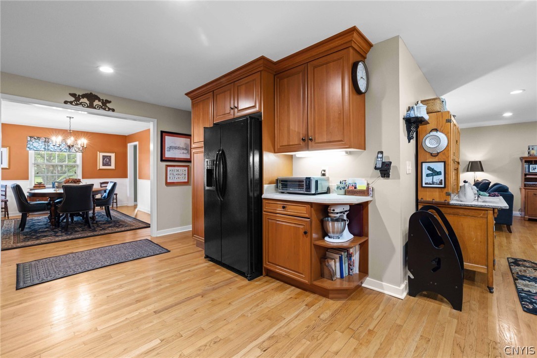 410 Meadow Road Geddes, NY 13219 - Photo 11 of 50 The kitchen has beautiful cherry cabinets, so much storage & counterspace.
