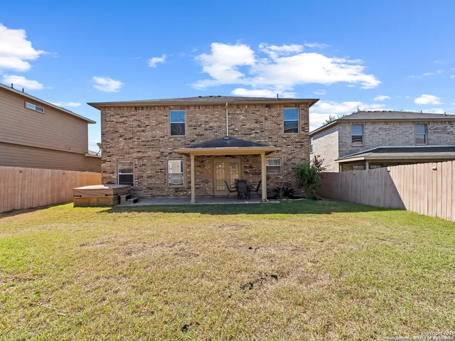 a view of a house with a patio