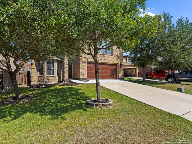 a house with trees in front of it