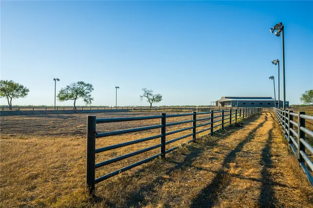 an aerial view of residential building and ocean