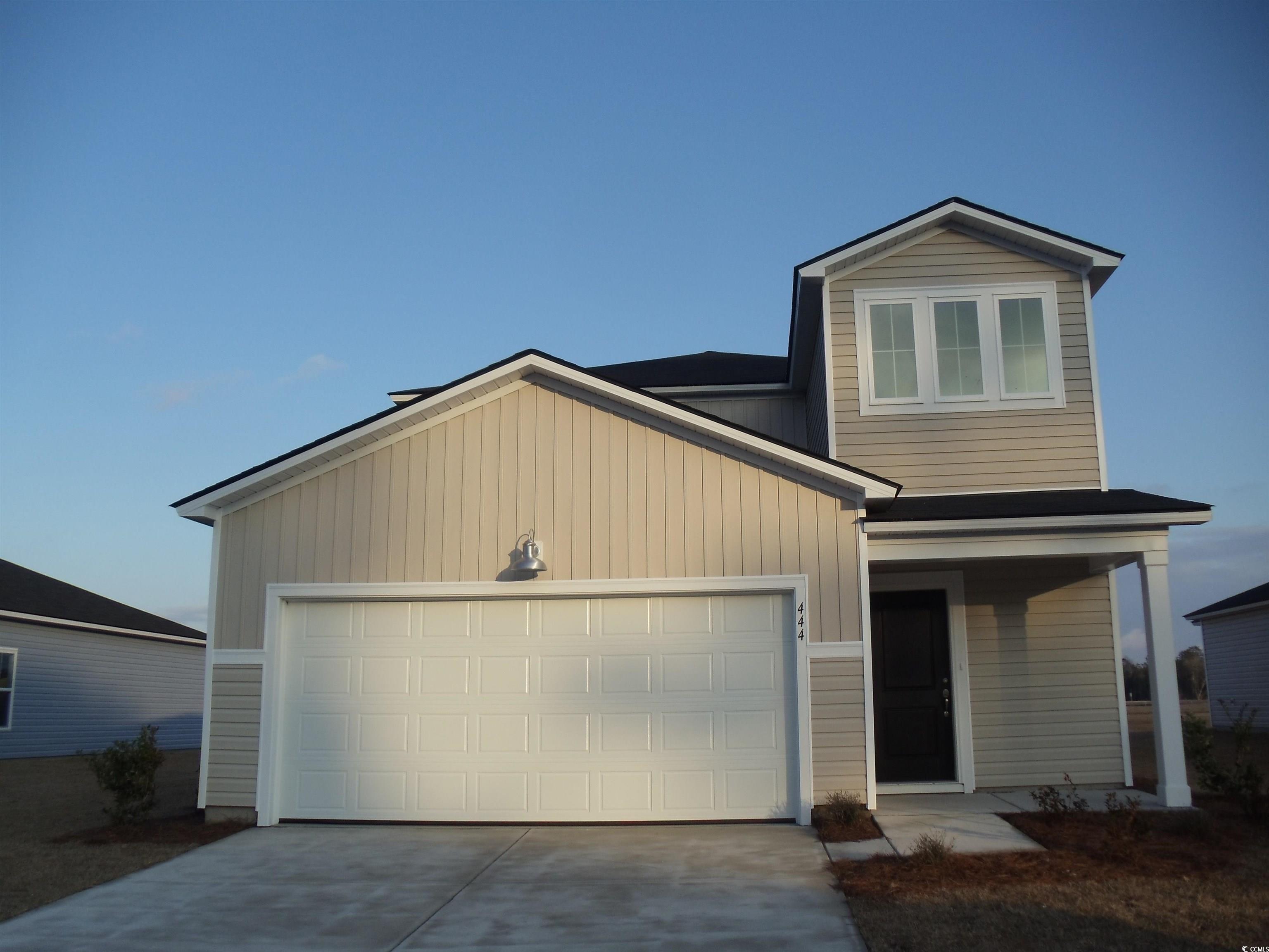 444 Ribbon Rail Way Loris, SC 29569 - Photo 1 of 5 View of front of house featuring an attached garag