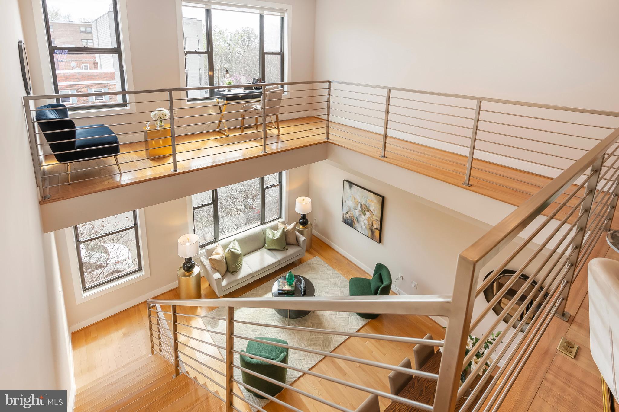 1402 K Street Southeast, Unit 2 Washington, DC 20003 - Photo 15 of 32 a view of a living room with furniture and floor to ceiling windows
