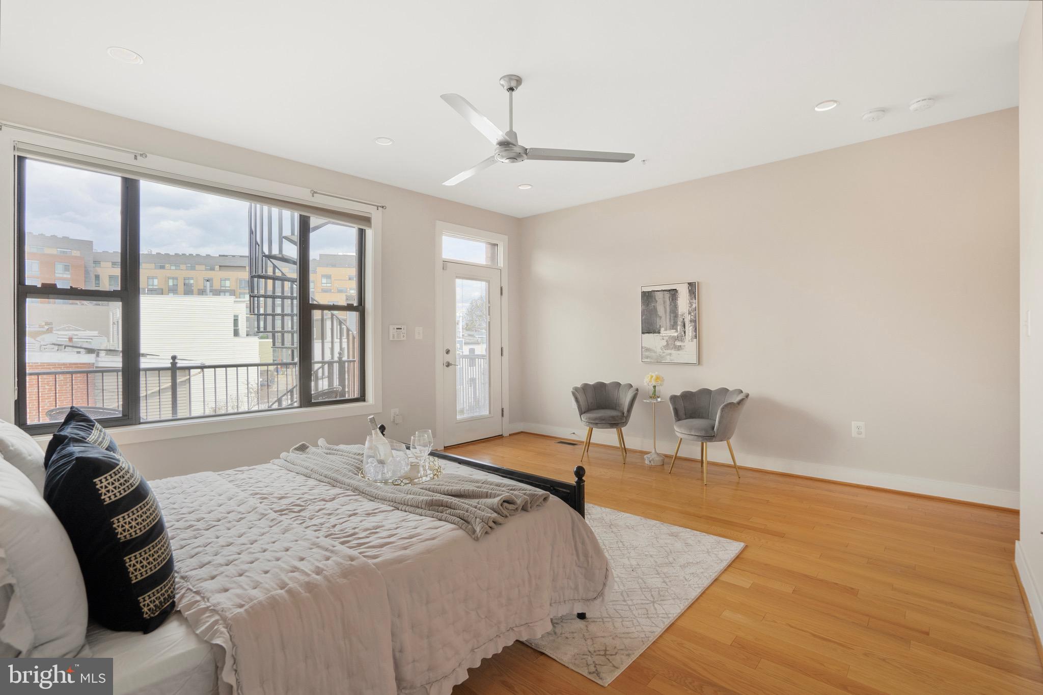 1402 K Street Southeast, Unit 2 Washington, DC 20003 - Photo 23 of 32 a bedroom with a bed and a large window