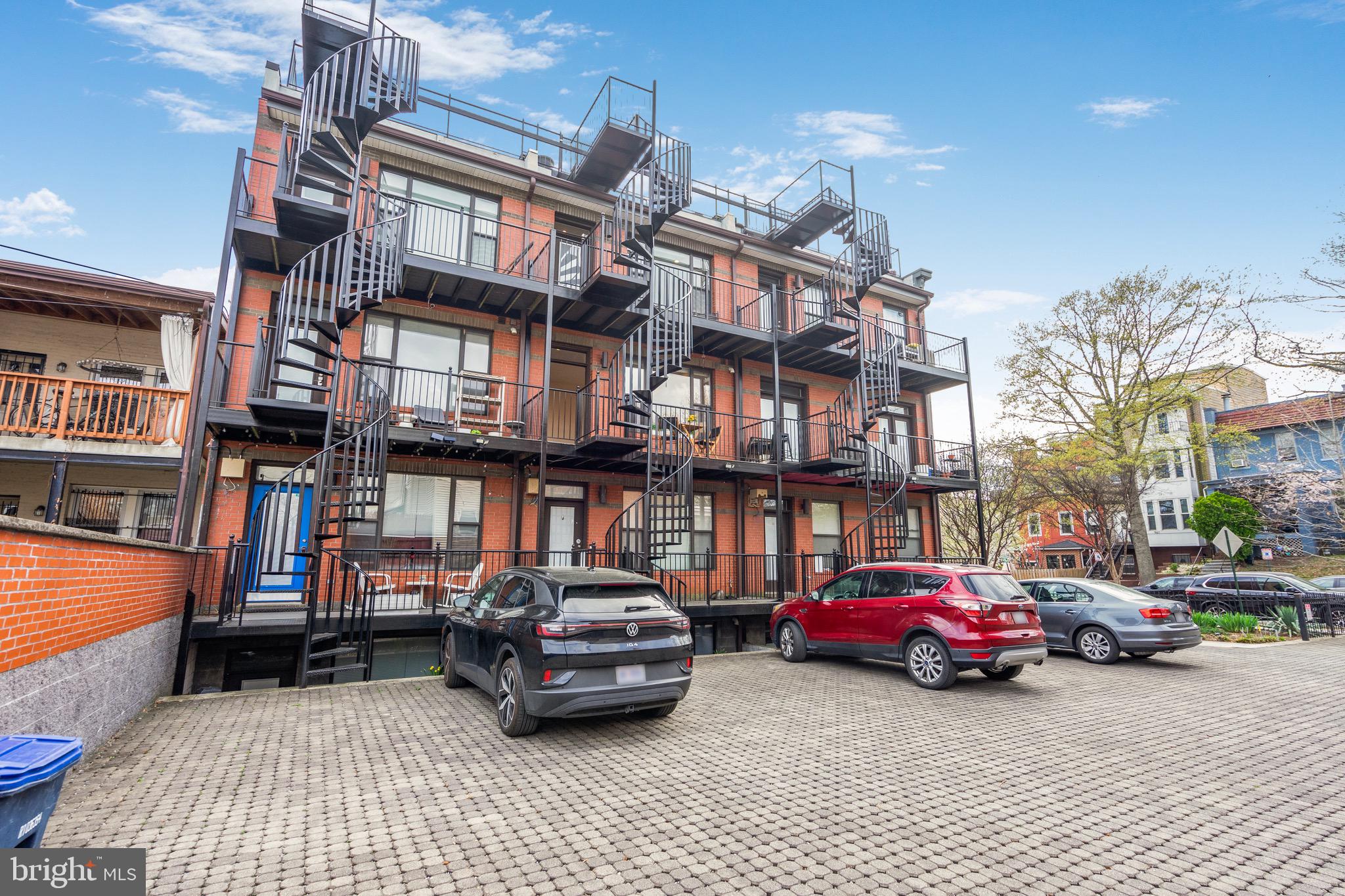 1402 K Street Southeast, Unit 2 Washington, DC 20003 - Photo 30 of 32 a car parked in front of a building