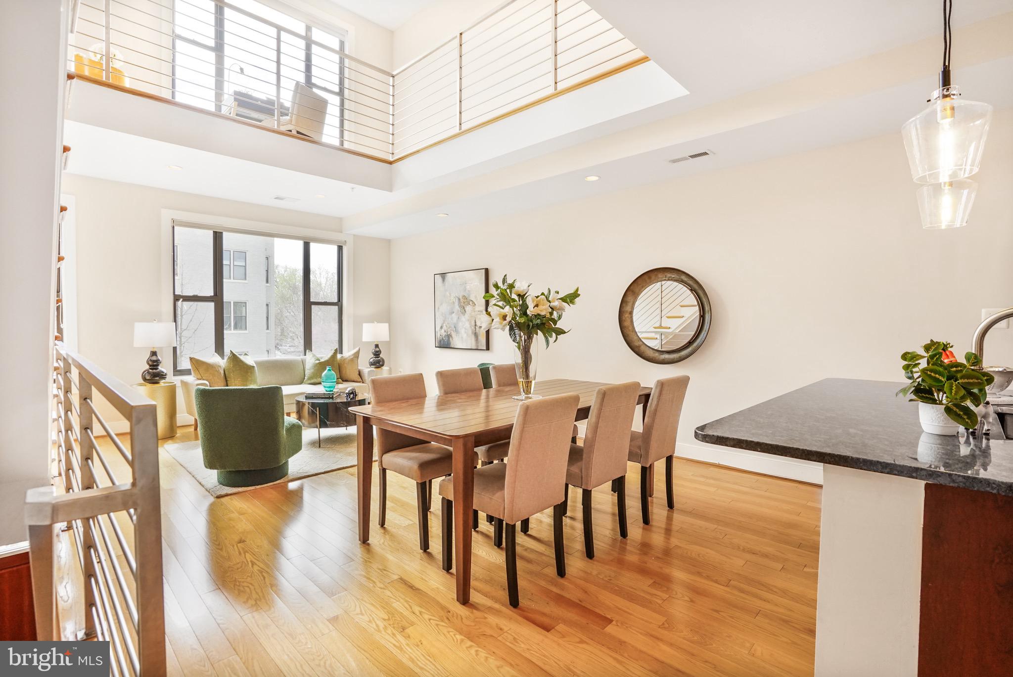 1402 K Street Southeast, Unit 2 Washington, DC 20003 - Photo 3 of 32 a view of a dining room with furniture window and wooden floor