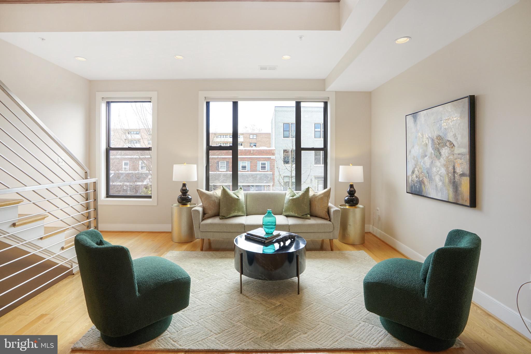 1402 K Street Southeast, Unit 2 Washington, DC 20003 - Photo 5 of 32 a living room with furniture and a large window