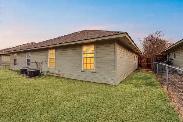 a view of backyard of house