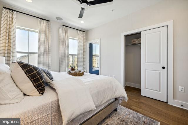 14917 Dispatch Street Rockville, MD 20850 - Photo 21 of 29 a bedroom with a bed and window