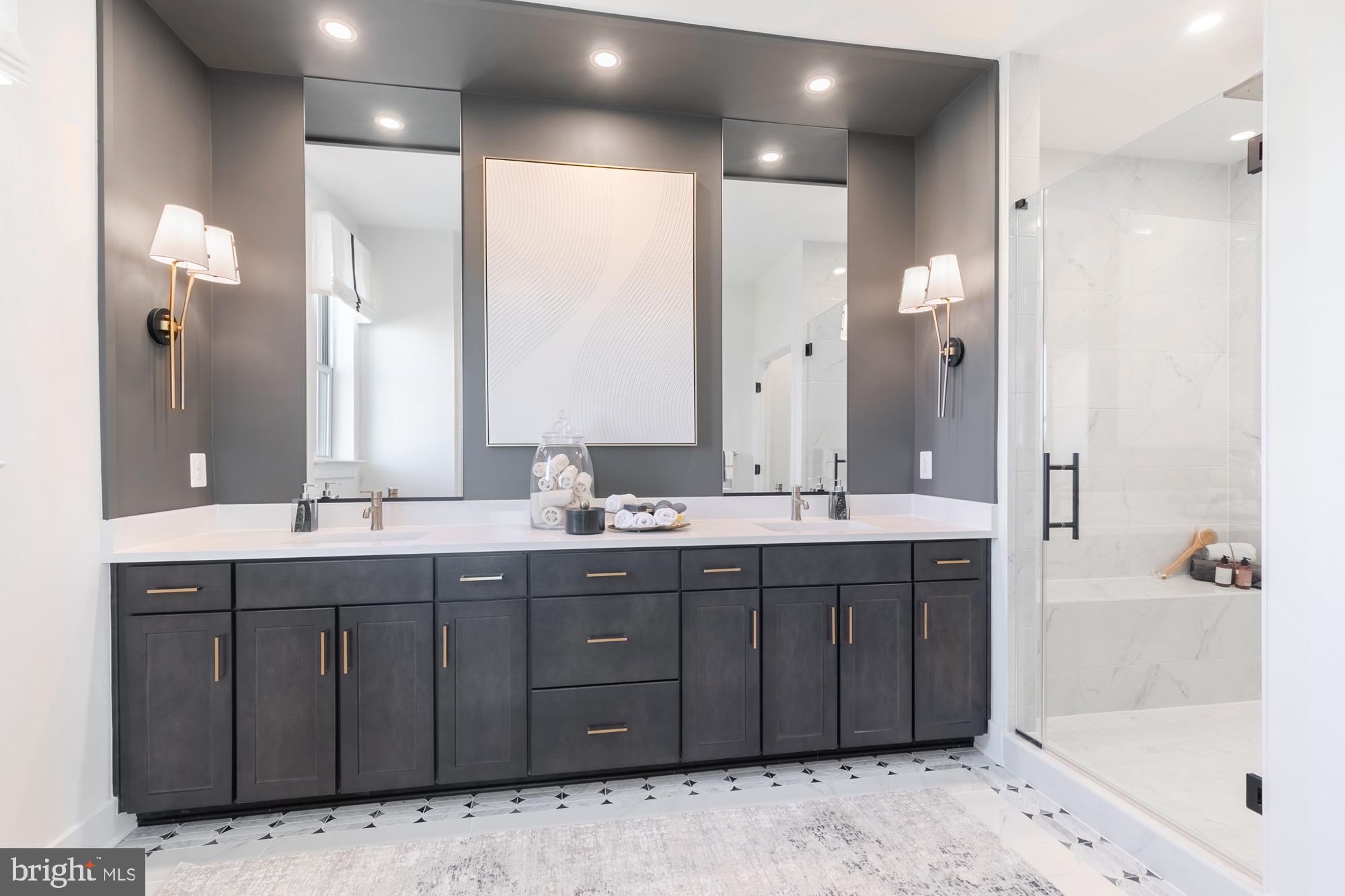 14917 Dispatch Street Rockville, MD 20850 - Photo 9 of 29 a bathroom with a tub sink shower and mirror