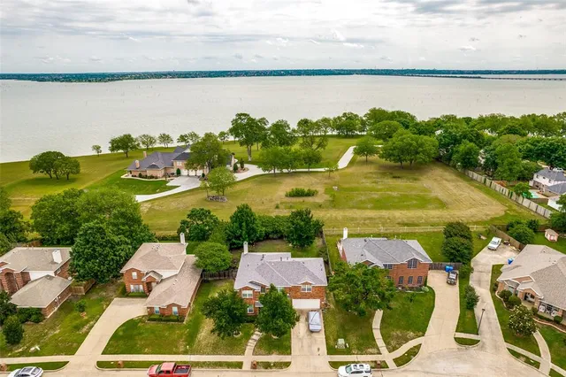 a view of lake and houses with outdoor space
