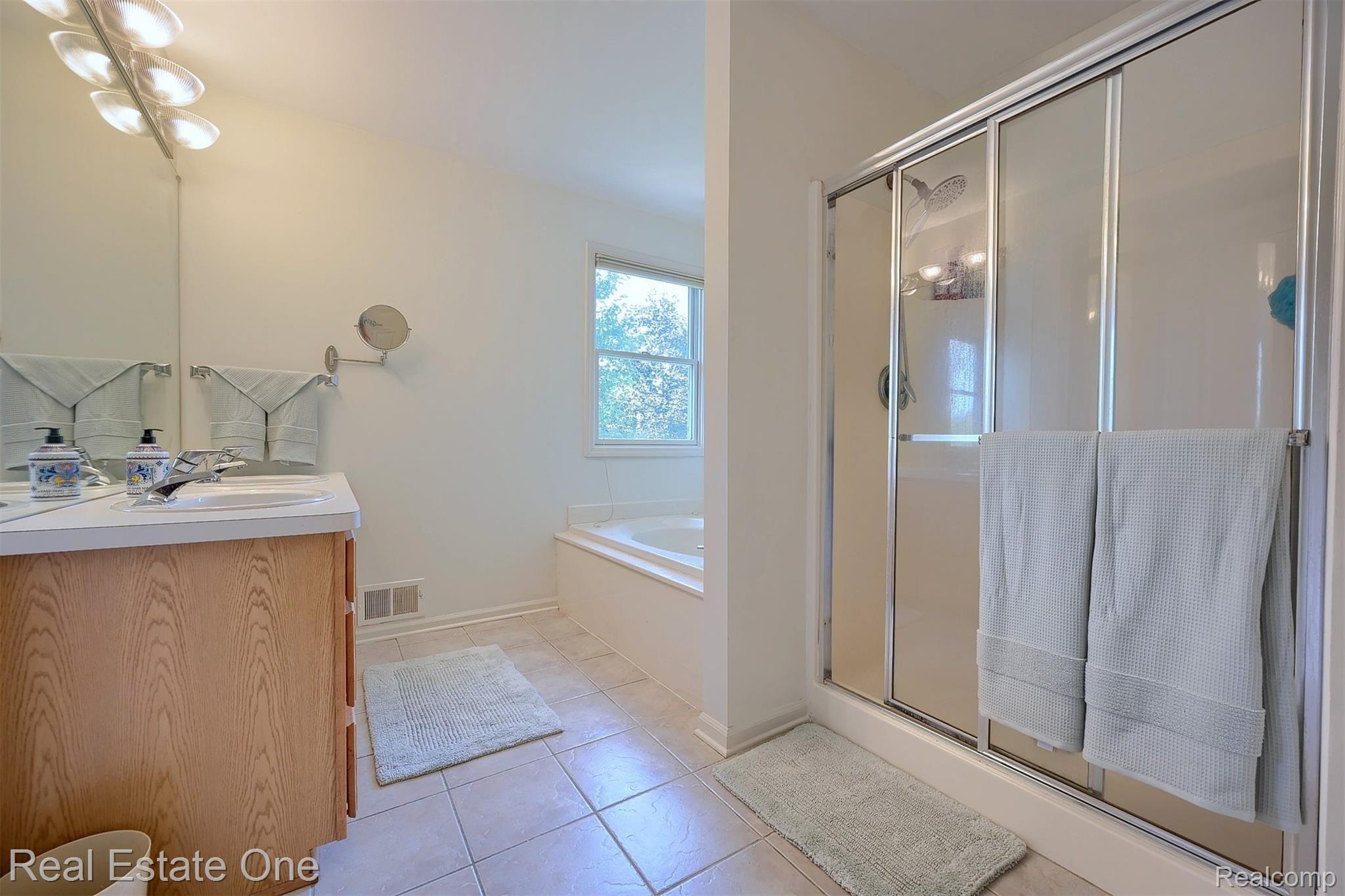 1762 Ring Neck Drive Rochester, MI 48307 - Photo 17 of 48 Master Bathroom w/Garden Tub and Tiled Flooring