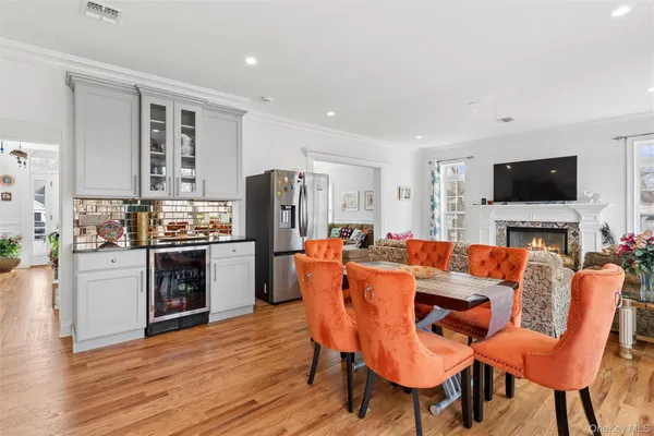 a view of kitchen with cabinets and wooden floor