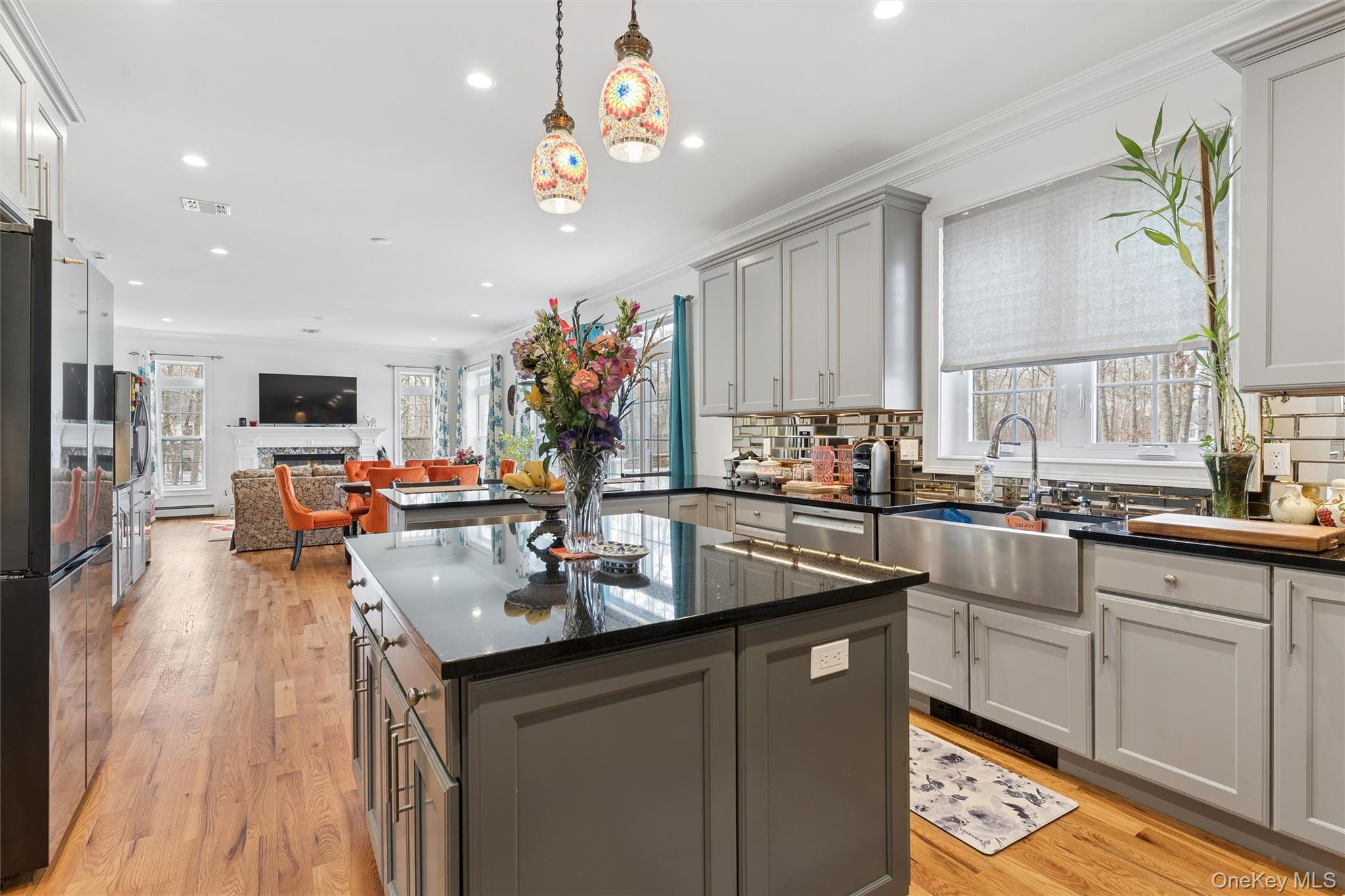 16 Gateway Court Hampton Bays, NY 11946 - Photo 13 of 30 a kitchen with counter space cabinets and appliances