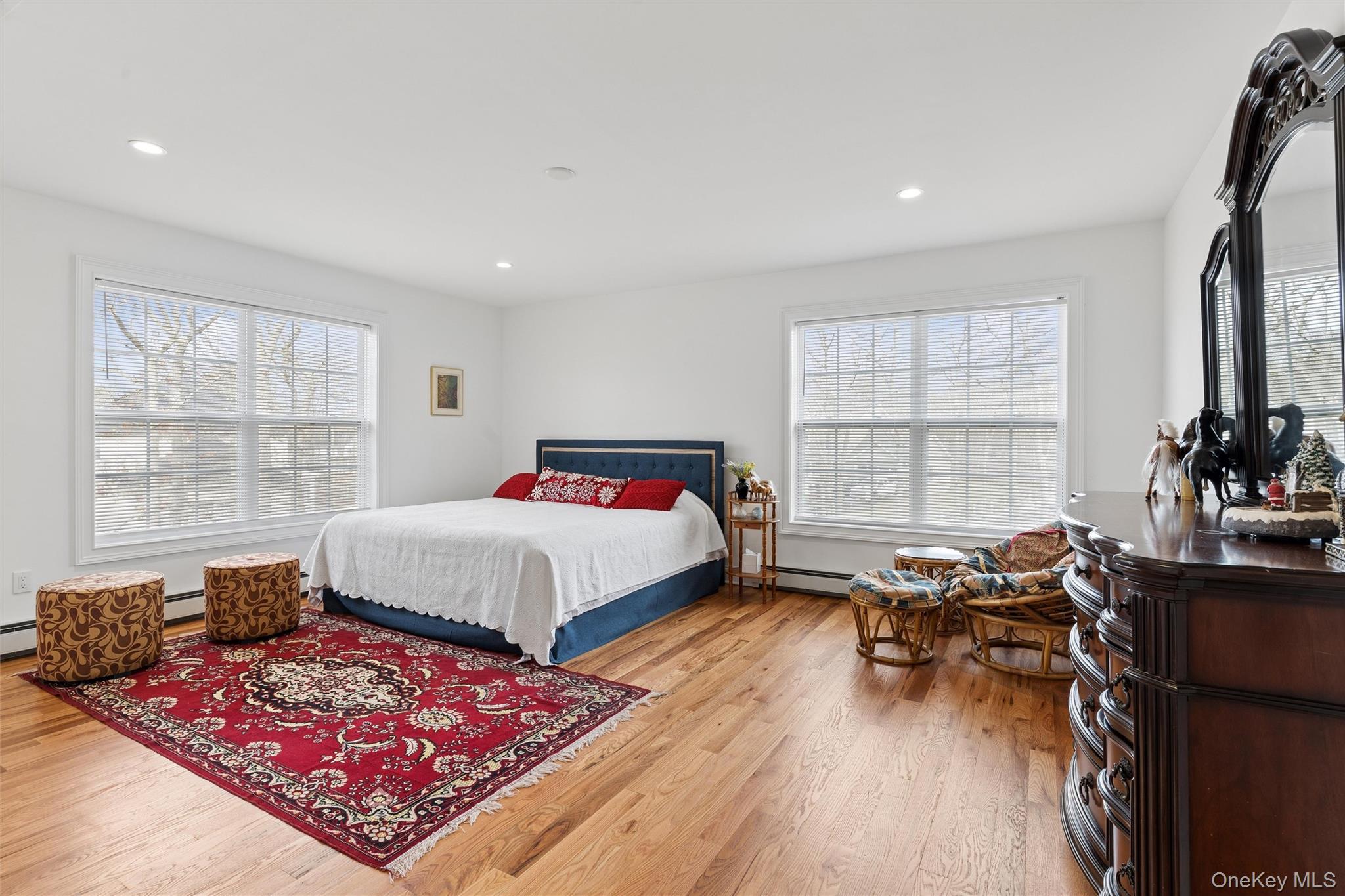 16 Gateway Court Hampton Bays, NY 11946 - Photo 19 of 30 a bed room with a bed and a window
