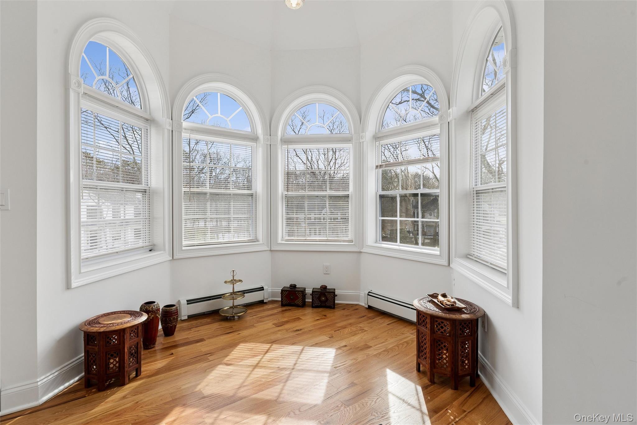 16 Gateway Court Hampton Bays, NY 11946 - Photo 21 of 30 a view of an apartment with furniture and a chandelier