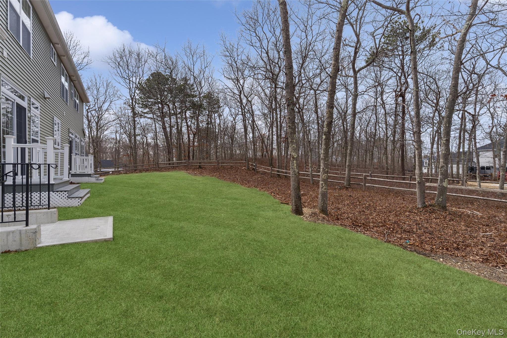 16 Gateway Court Hampton Bays, NY 11946 - Photo 30 of 30 a view of a park with large trees