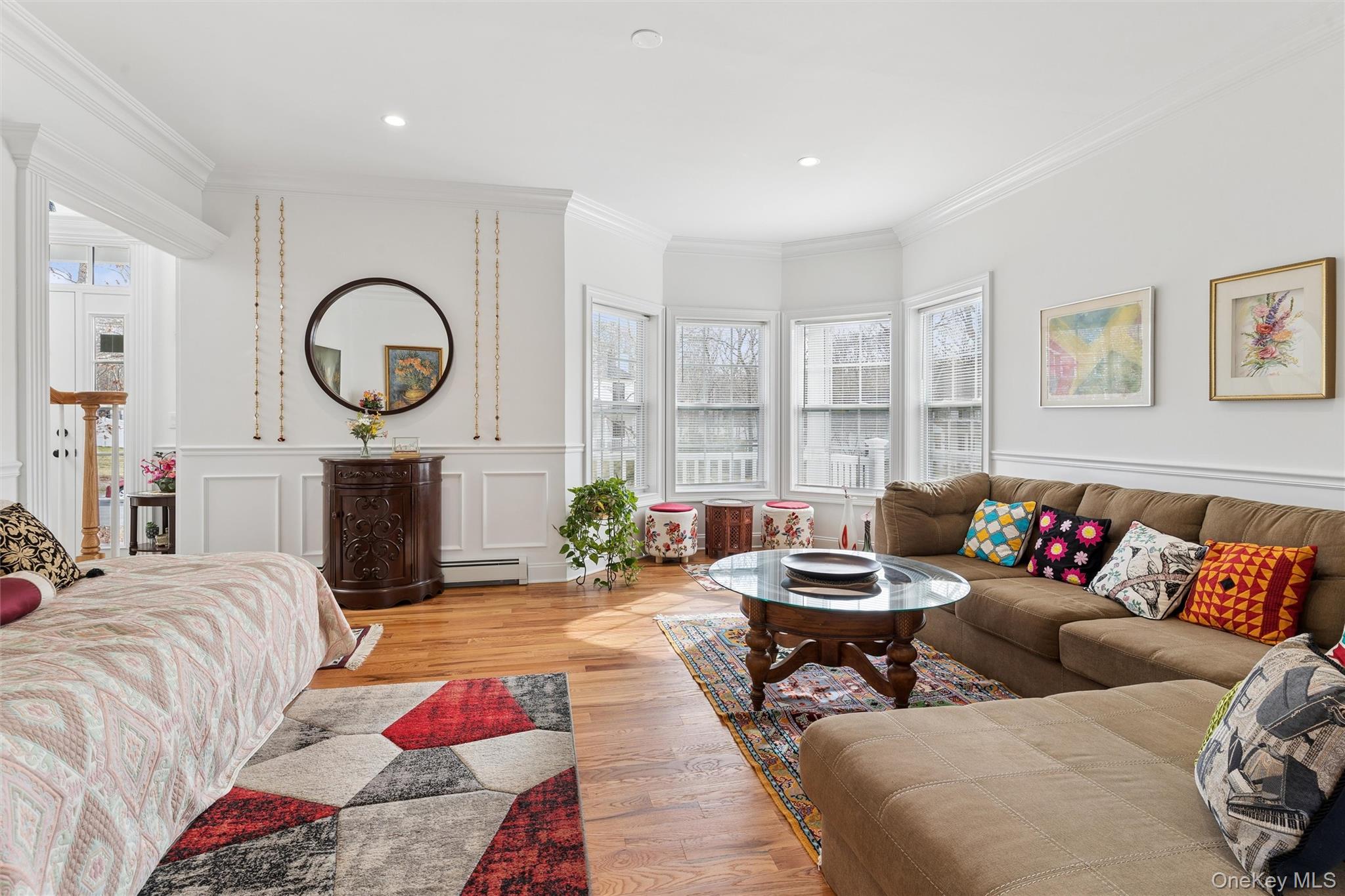 16 Gateway Court Hampton Bays, NY 11946 - Photo 5 of 30 a living room with furniture and a fireplace