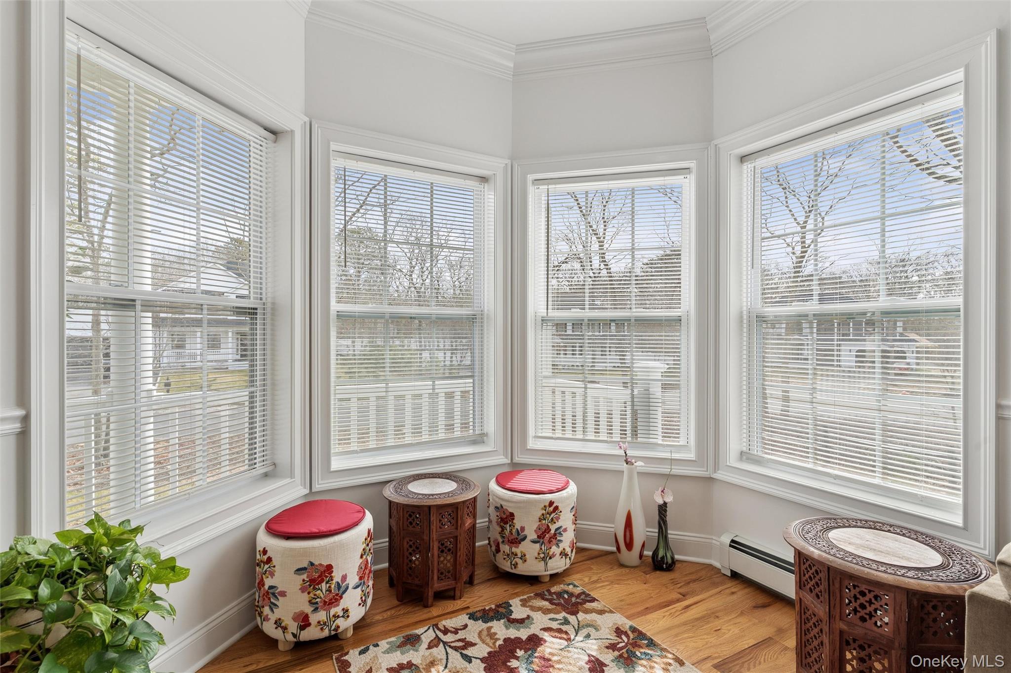 16 Gateway Court Hampton Bays, NY 11946 - Photo 6 of 30 a bedroom with furniture and a window