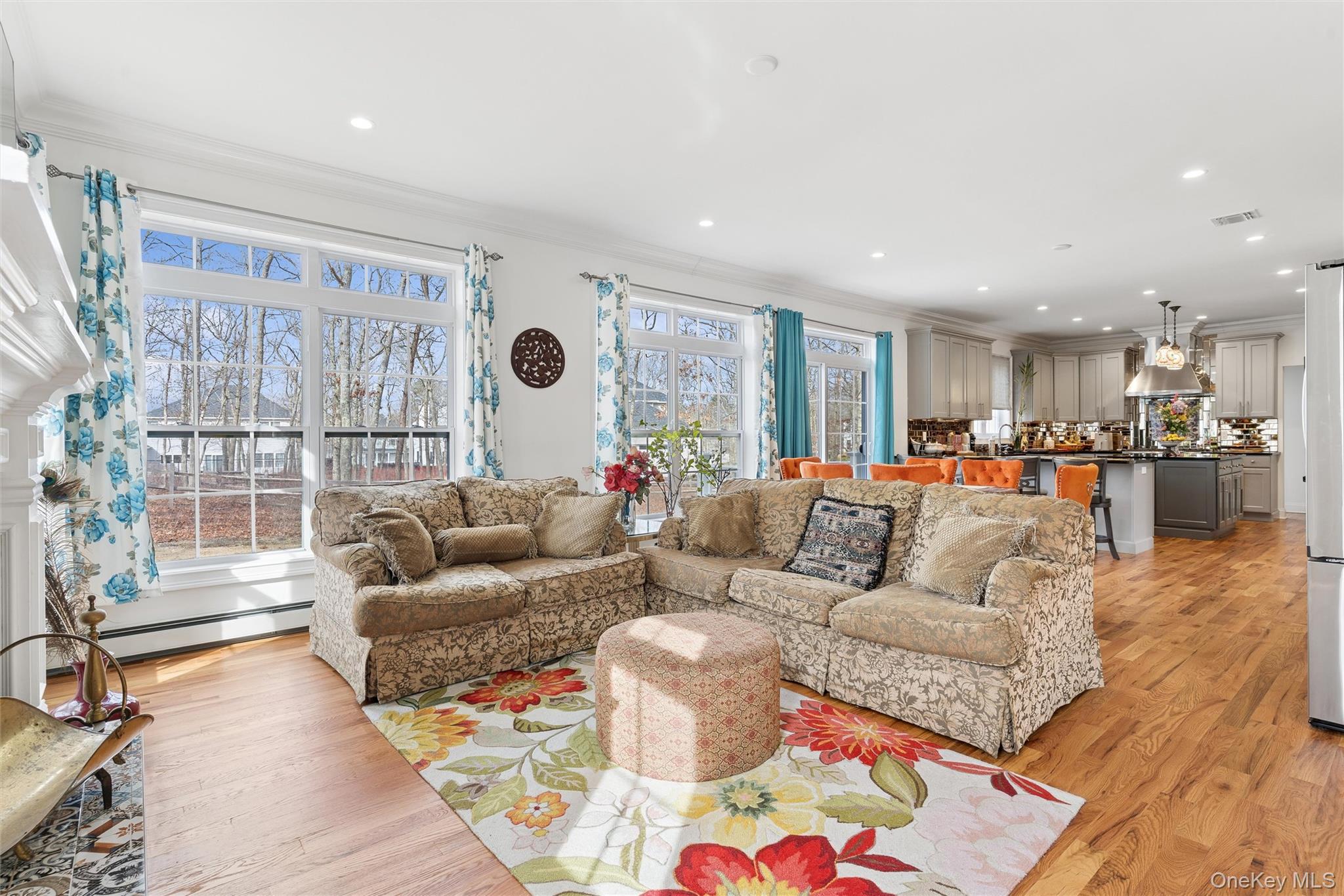 16 Gateway Court Hampton Bays, NY 11946 - Photo 7 of 30 a living room with furniture and a large window