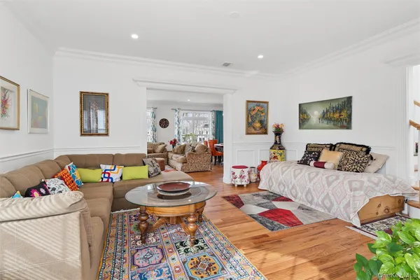 a living room with furniture and a table