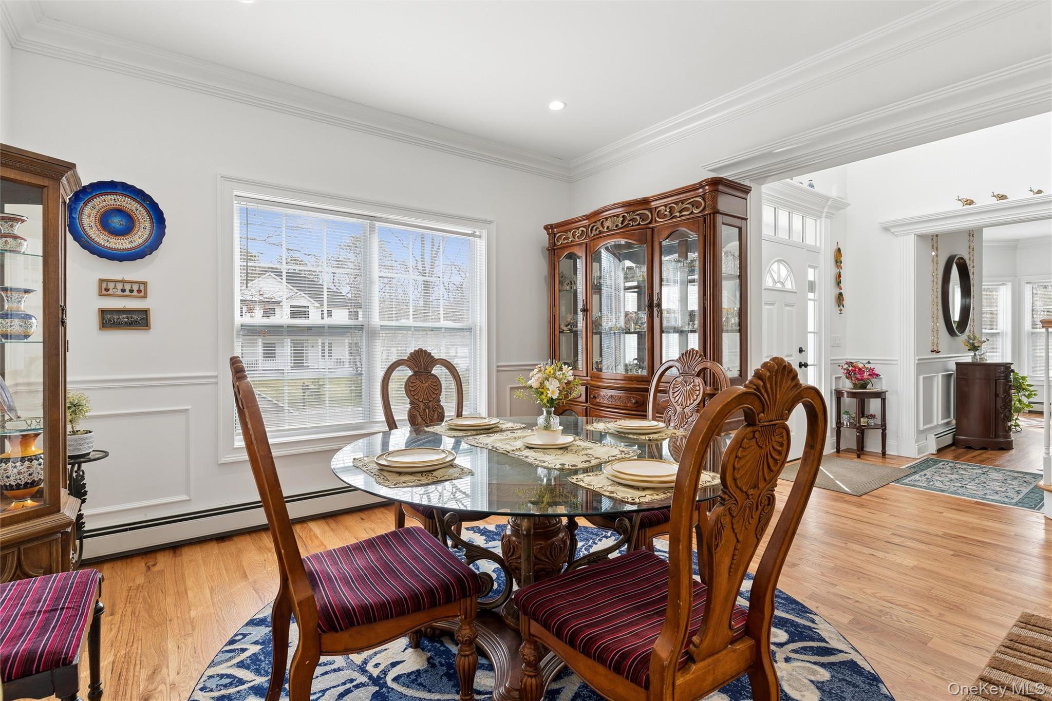 16 Gateway Court Hampton Bays, NY 11946 - Photo 10 of 30 a view of a dining room with furniture and window