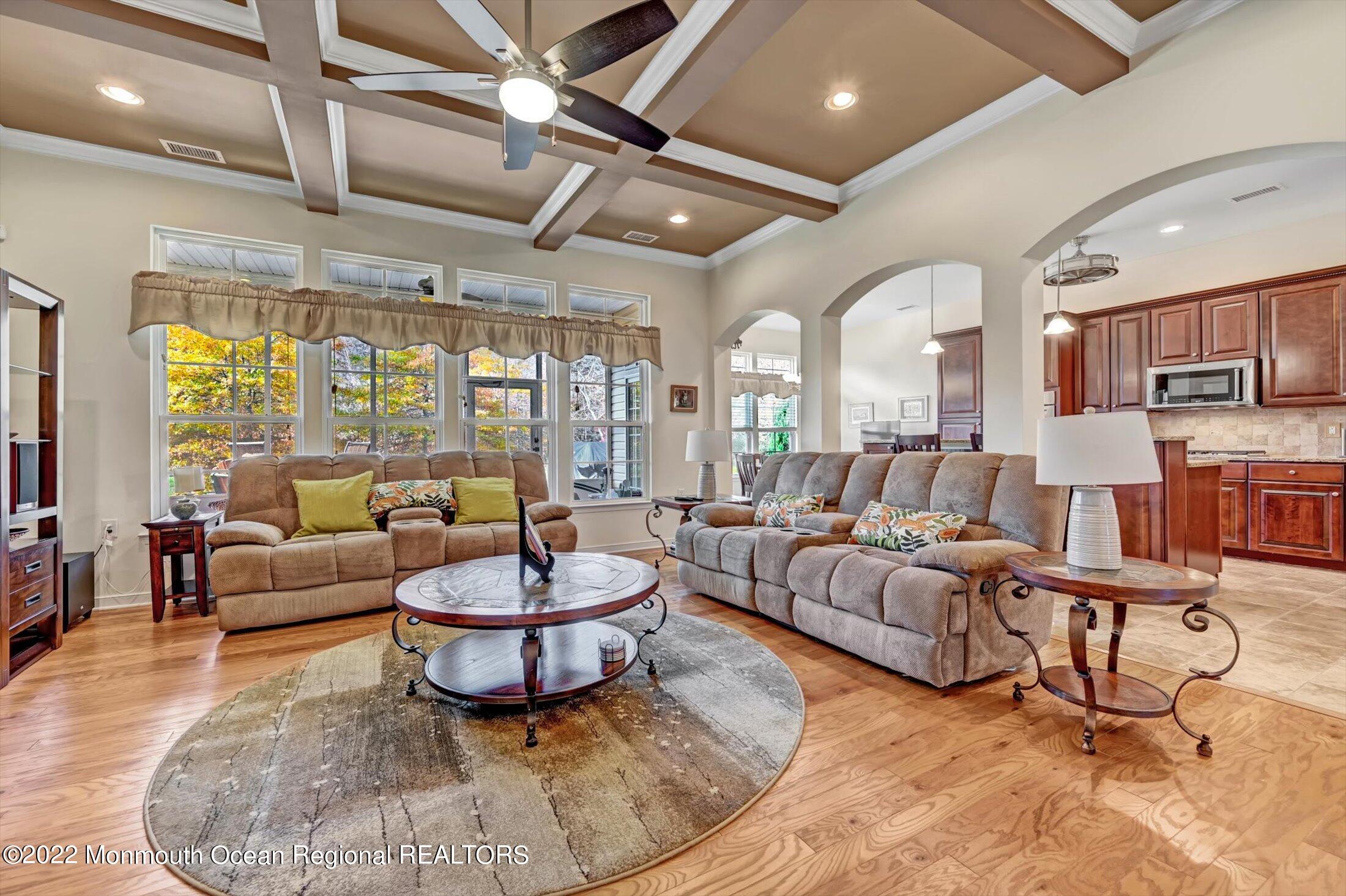 20 East Francesa Court Farmingdale, NJ 07727 - Photo 11 of 78 a living room with furniture and a large window