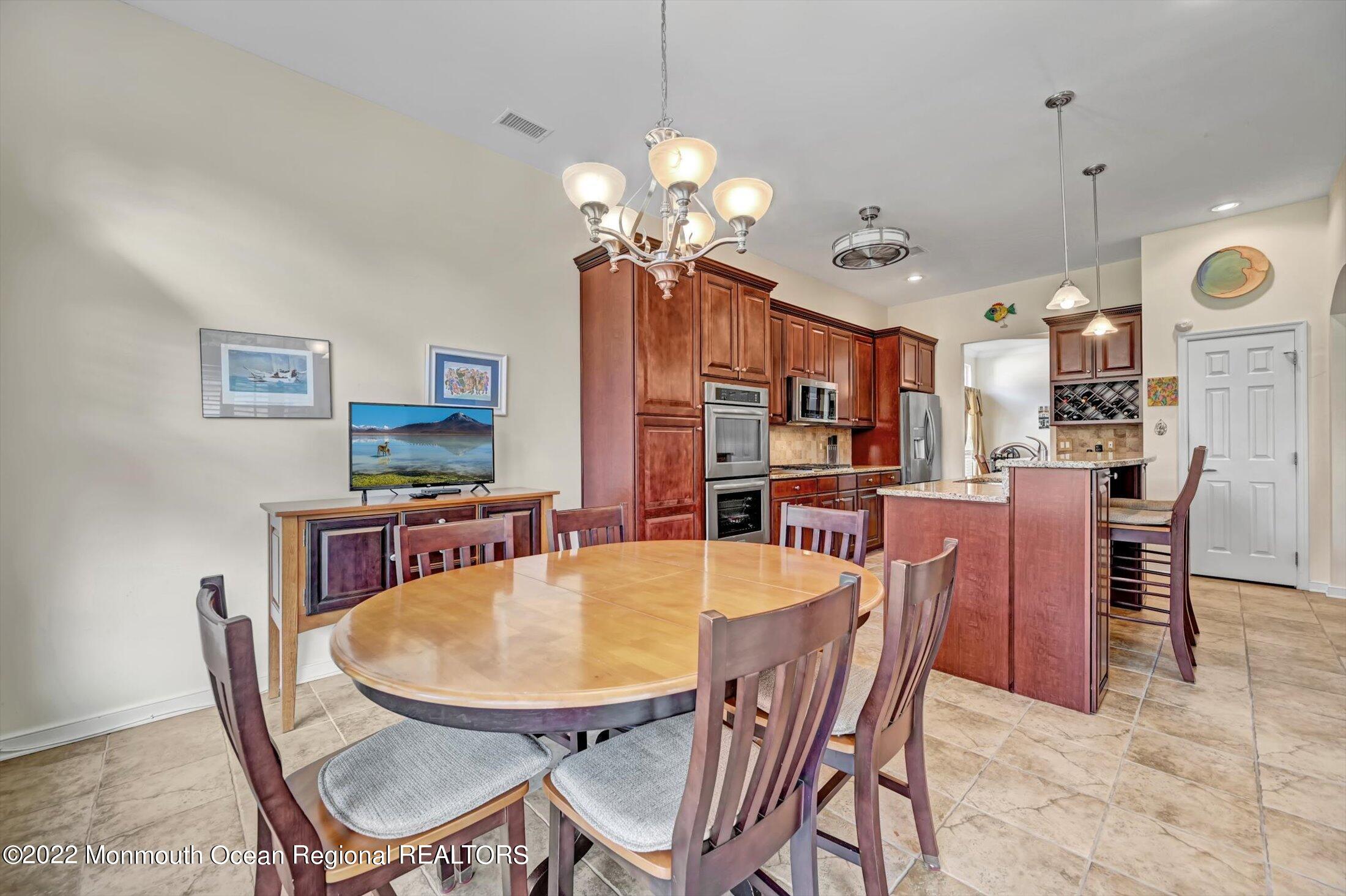 20 East Francesa Court Farmingdale, NJ 07727 - Photo 21 of 78 a dining room with furniture and window