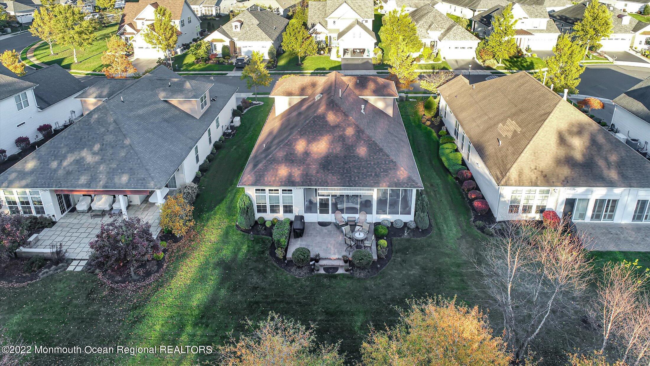20 East Francesa Court Farmingdale, NJ 07727 - Photo 47 of 78 an aerial view of residential houses with outdoor space and trees
