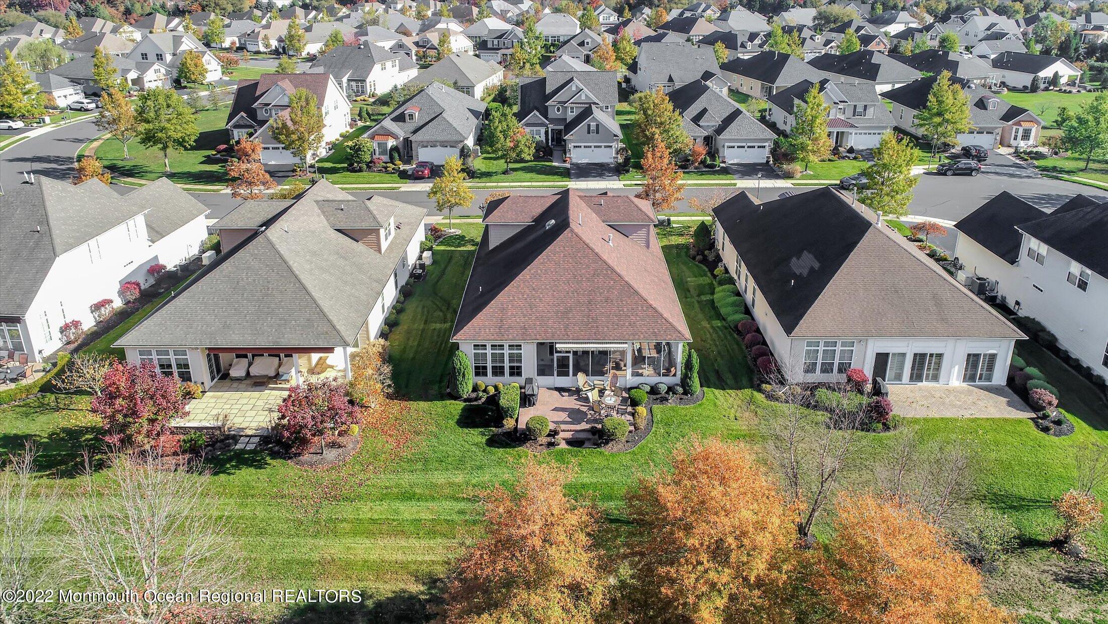 20 East Francesa Court Farmingdale, NJ 07727 - Photo 51 of 78 an aerial view of a house with garden space and street view