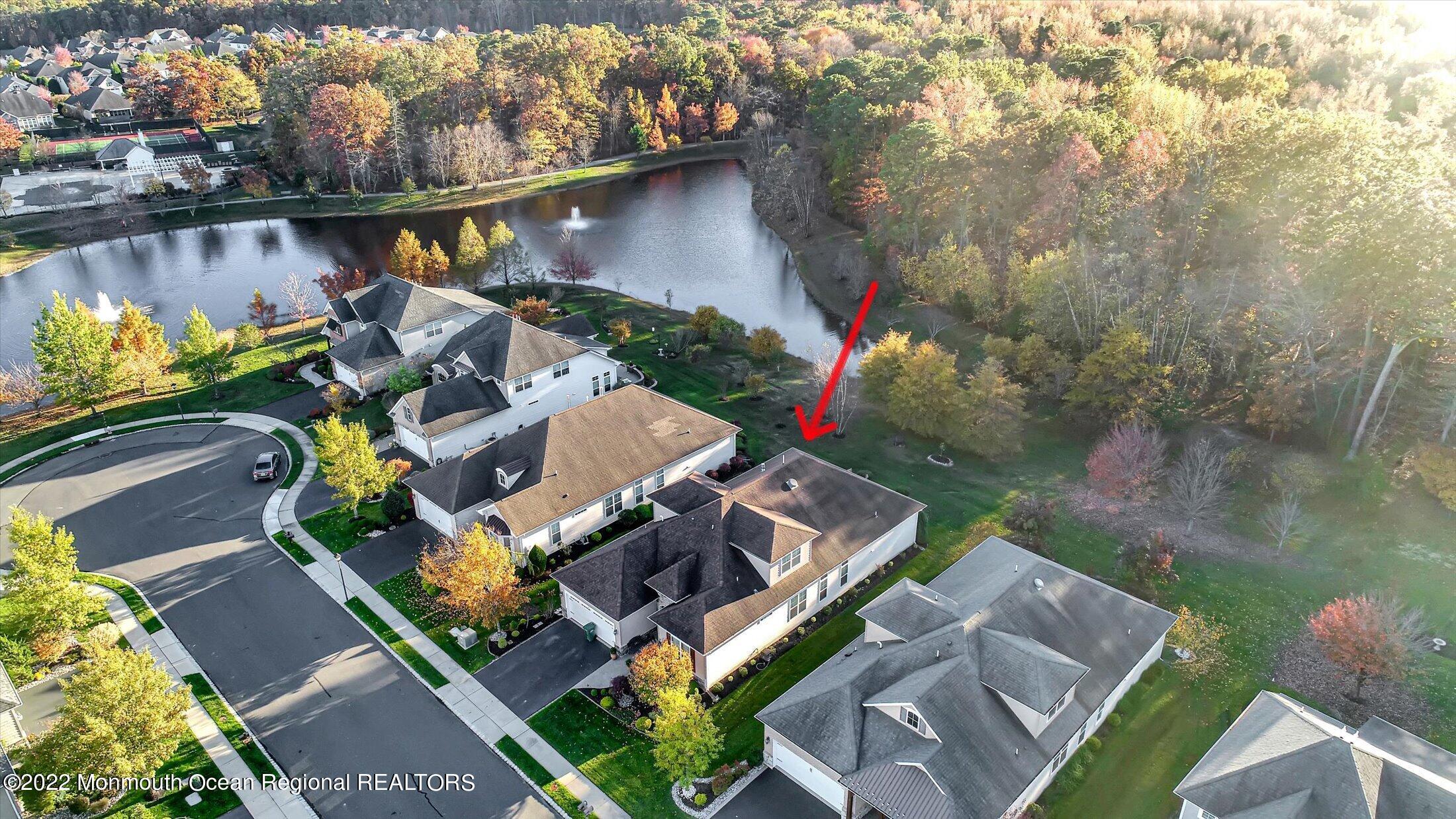 20 East Francesa Court Farmingdale, NJ 07727 - Photo 52 of 78 an aerial view of a house with garden space and sitting area