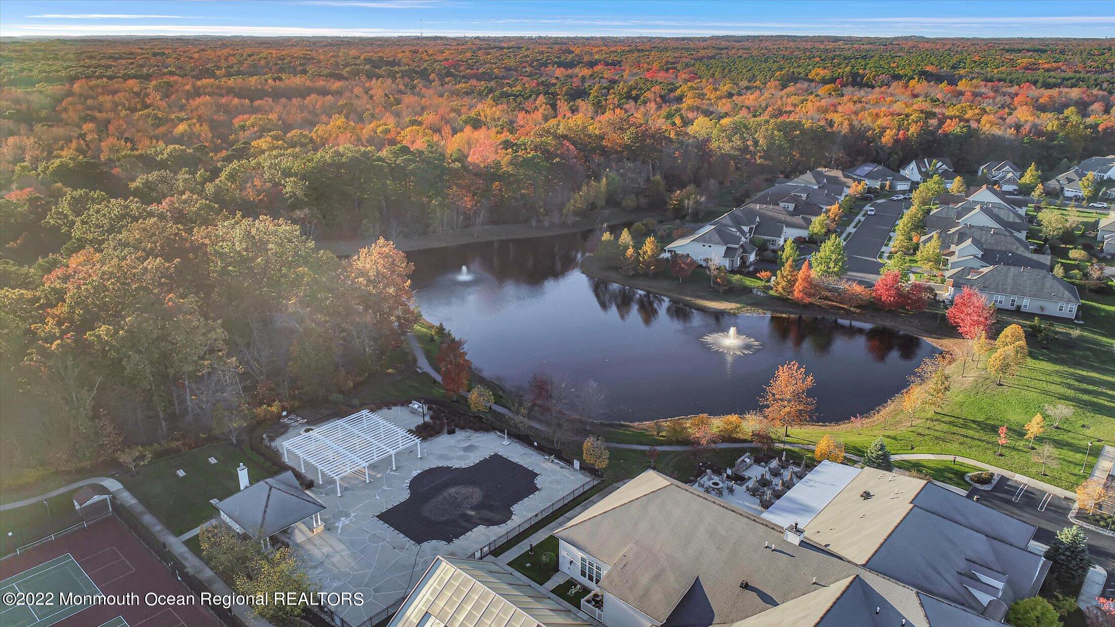20 East Francesa Court Farmingdale, NJ 07727 - Photo 54 of 78 an aerial view of a house with a lake view