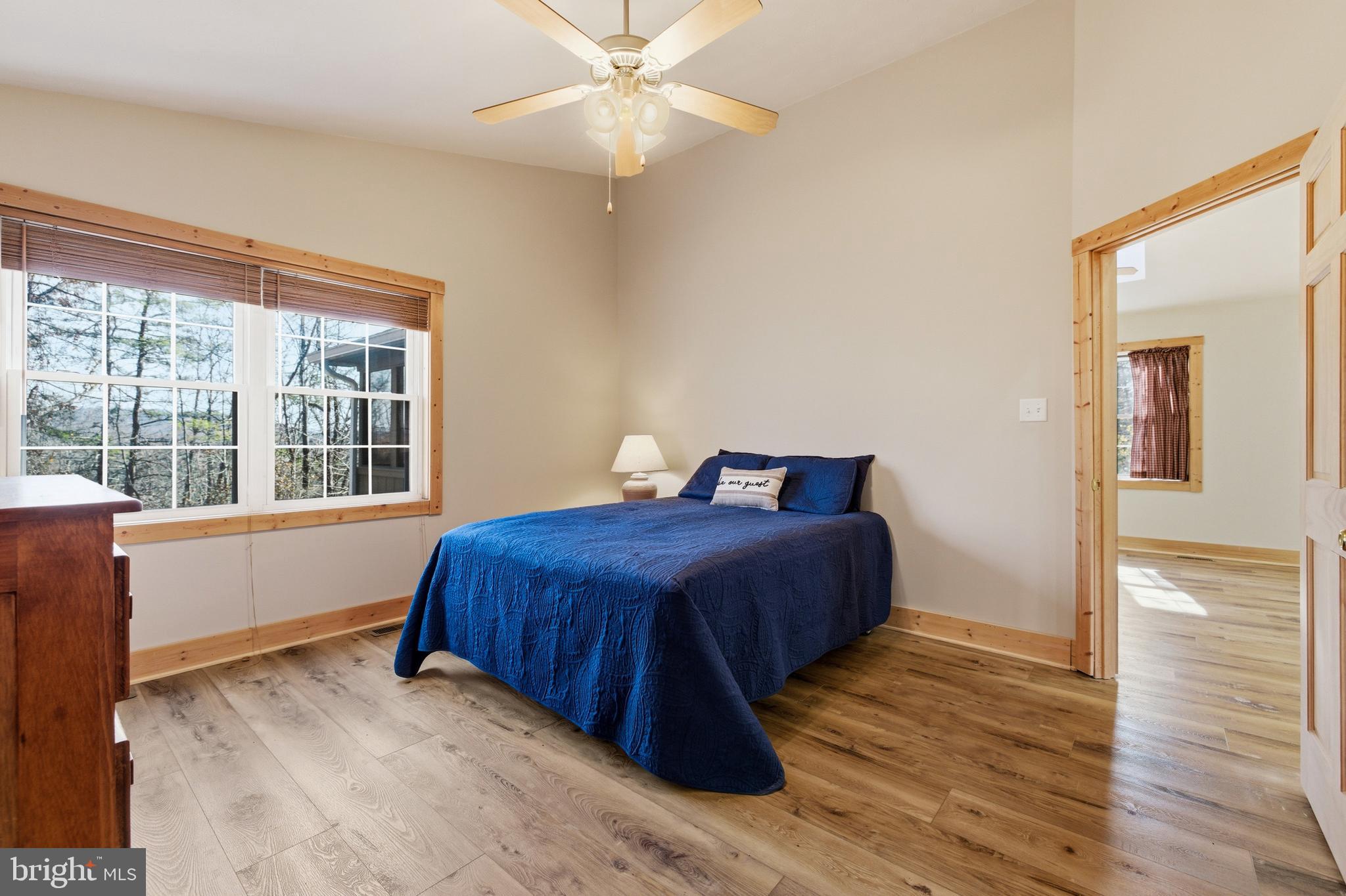 86 Maple Avenue Mount Jackson, VA 22842 - Photo 12 of 49 a bedroom with a bed and wooden floor