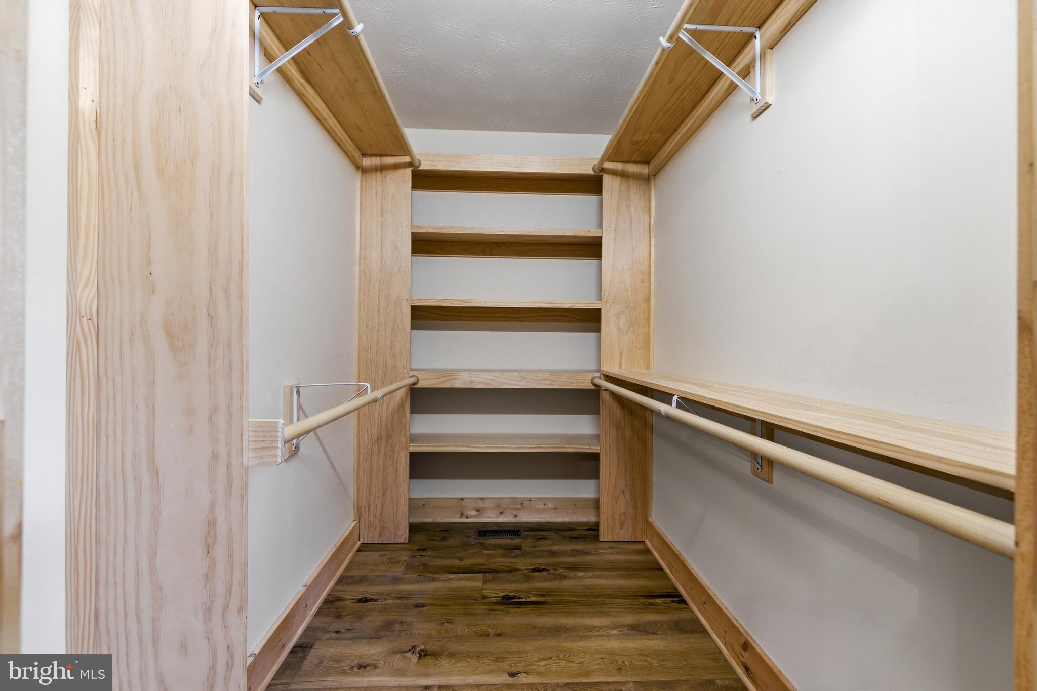 86 Maple Avenue Mount Jackson, VA 22842 - Photo 15 of 49 a view of walk in closet with empty racks