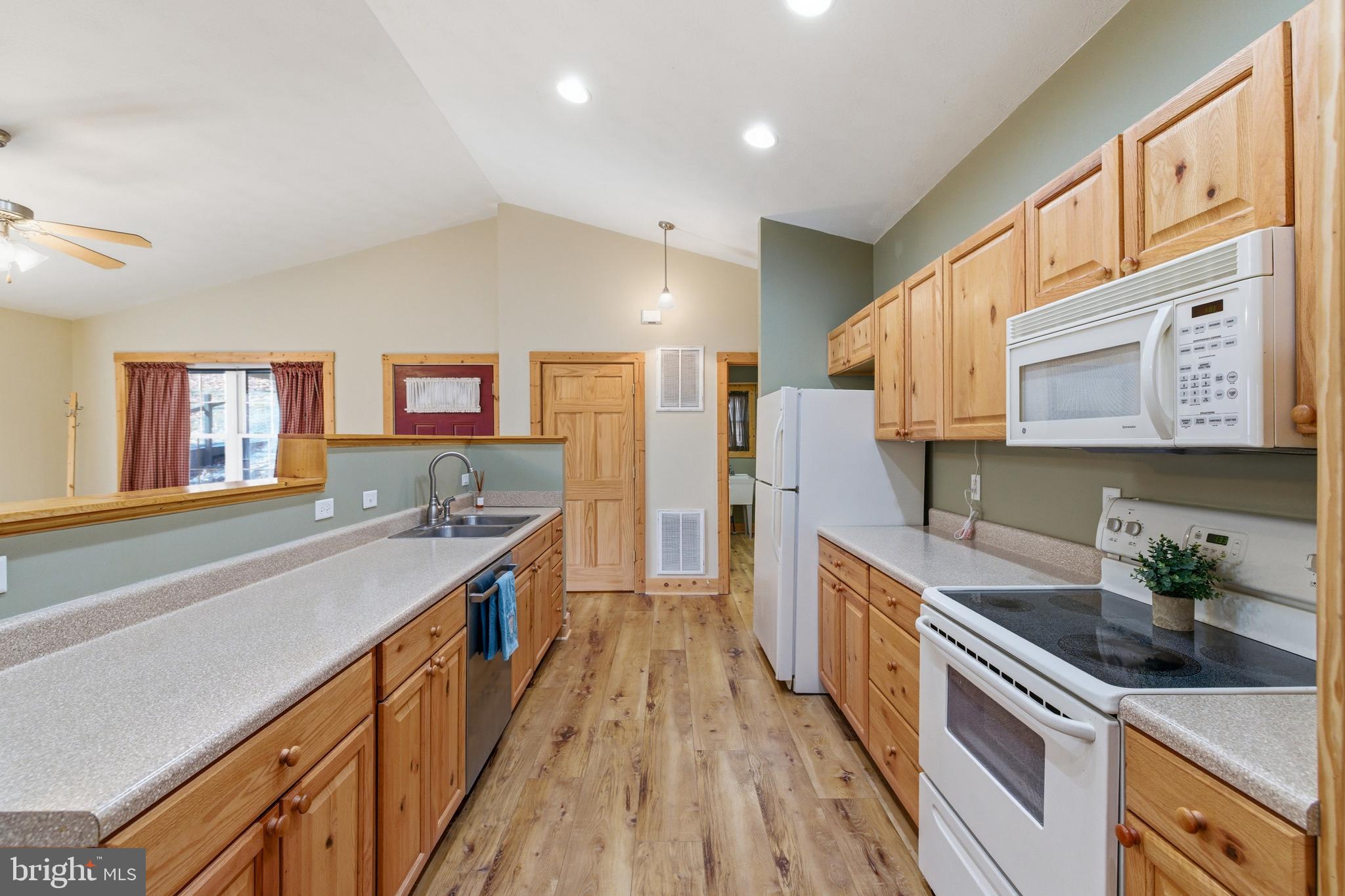 86 Maple Avenue Mount Jackson, VA 22842 - Photo 4 of 49 a kitchen with stainless steel appliances granite countertop lots of counter top space and wooden floor