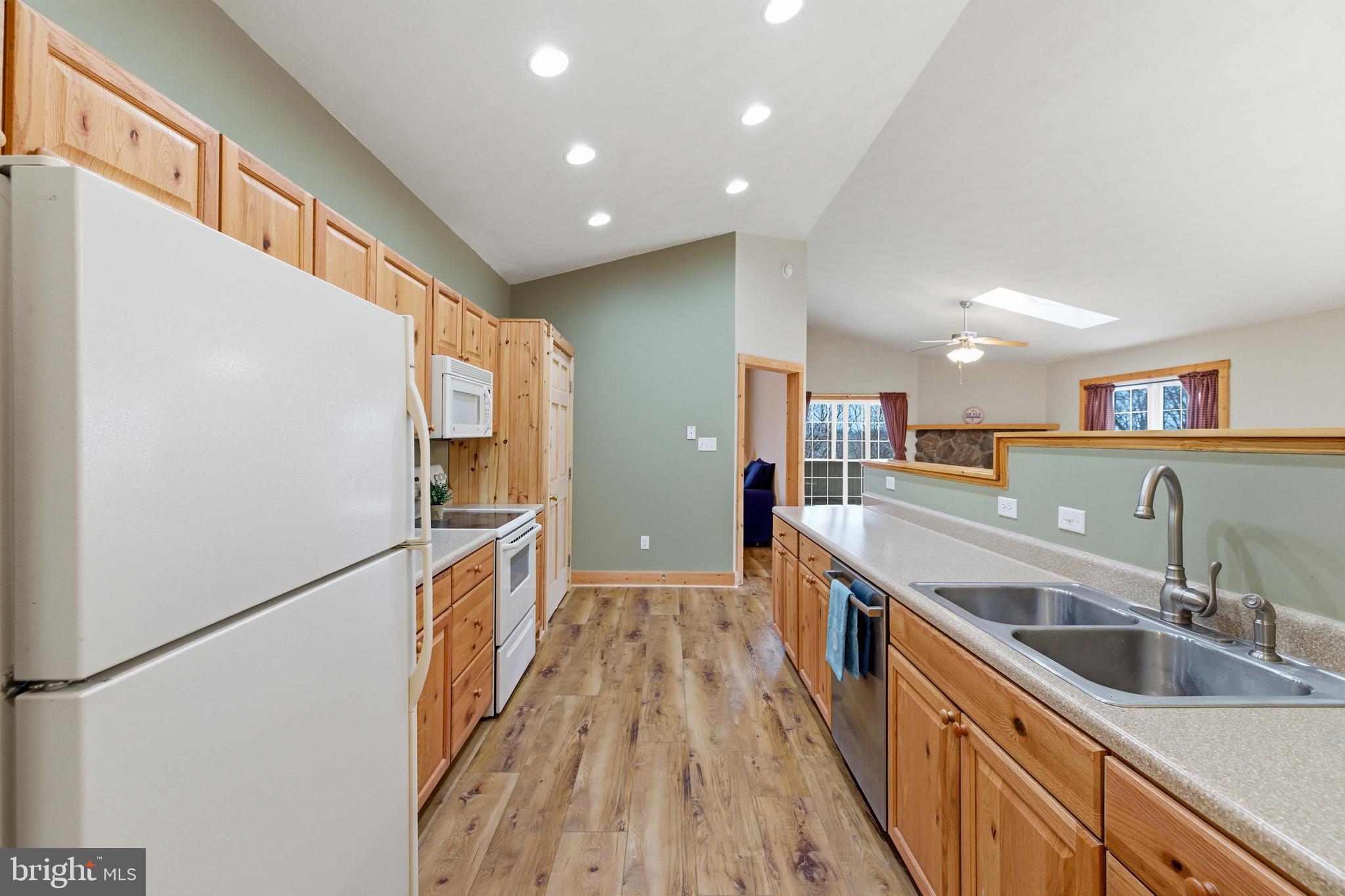 86 Maple Avenue Mount Jackson, VA 22842 - Photo 6 of 49 a kitchen with stainless steel appliances granite countertop a sink and a refrigerator
