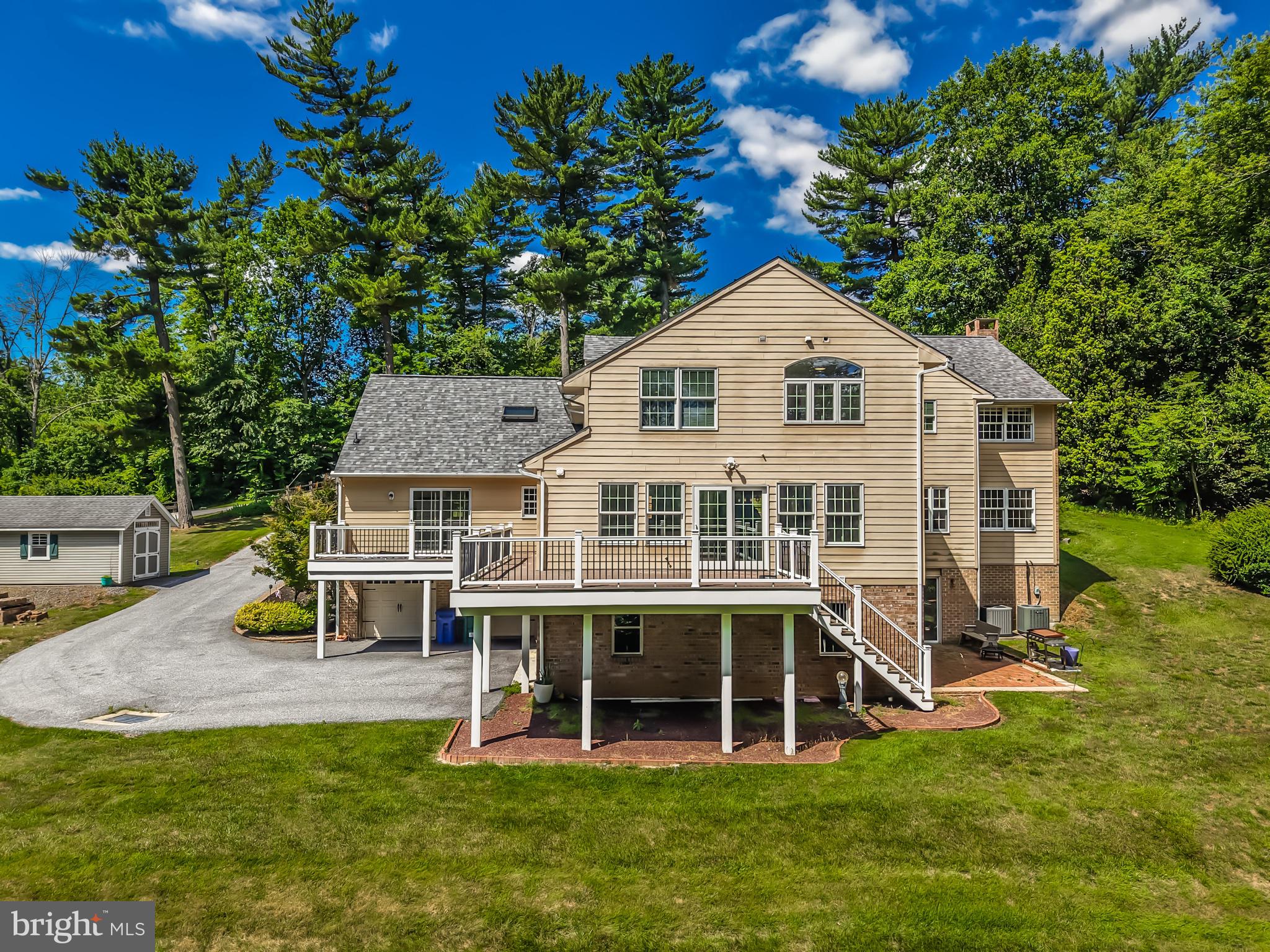 146 Logtown Road Media, PA 19063 - Photo 122 of 128 Charming home with lush green backdrop.